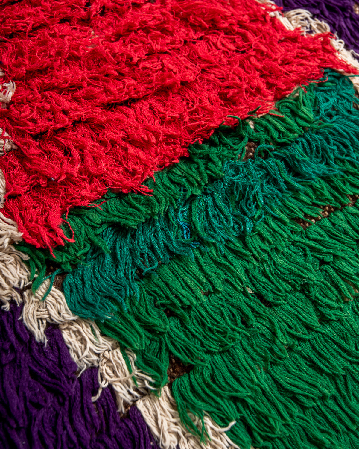 Modern designer vintage handcrafted Berber rug from Morocco. Boucherouite runner rug with beautiful colors and patterns.